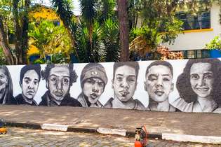 O grafiteiro do litoral paulista Francisco Kleyson fez um grafite na fachada da Escola Raul Brasil, em Suzano (SP), para homenagear as vítimas