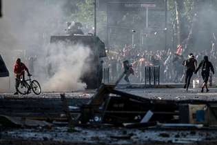 Confrontos no Chile. A capital Santiago teve uma semana de intensos e violentos protestos, que ainda não dão sinais de recuo.